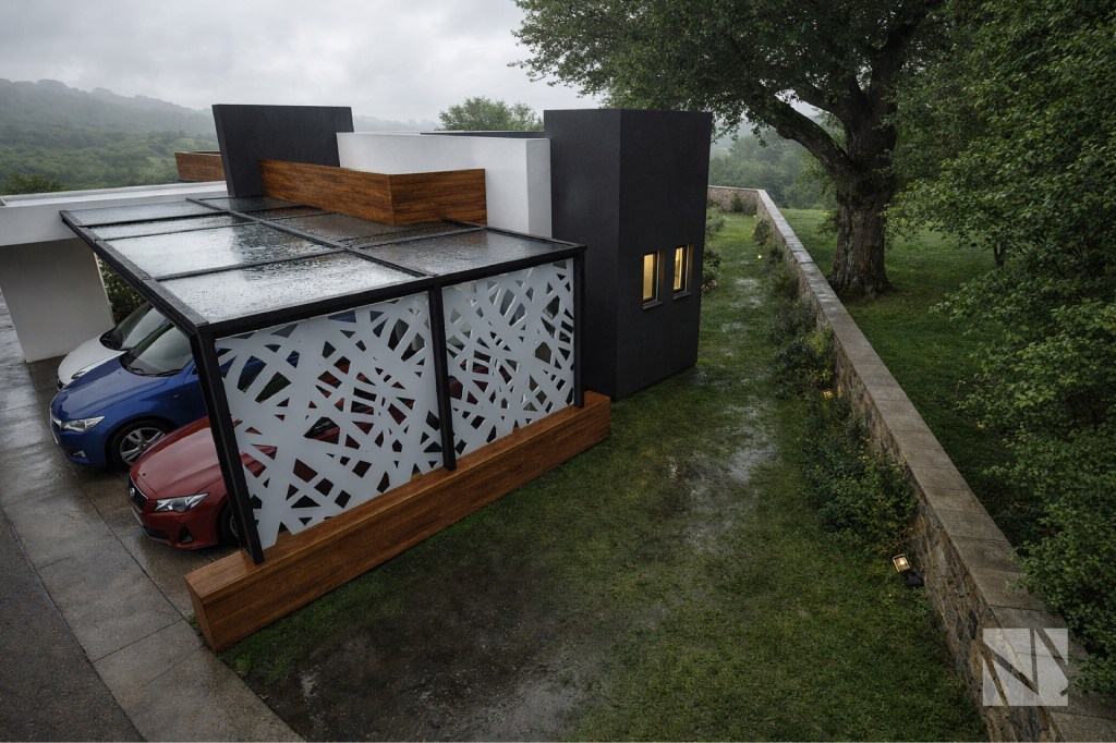 Acceso y área de estacionamiento de casa moderna en Residencial El Encanto diseñada por Modulare